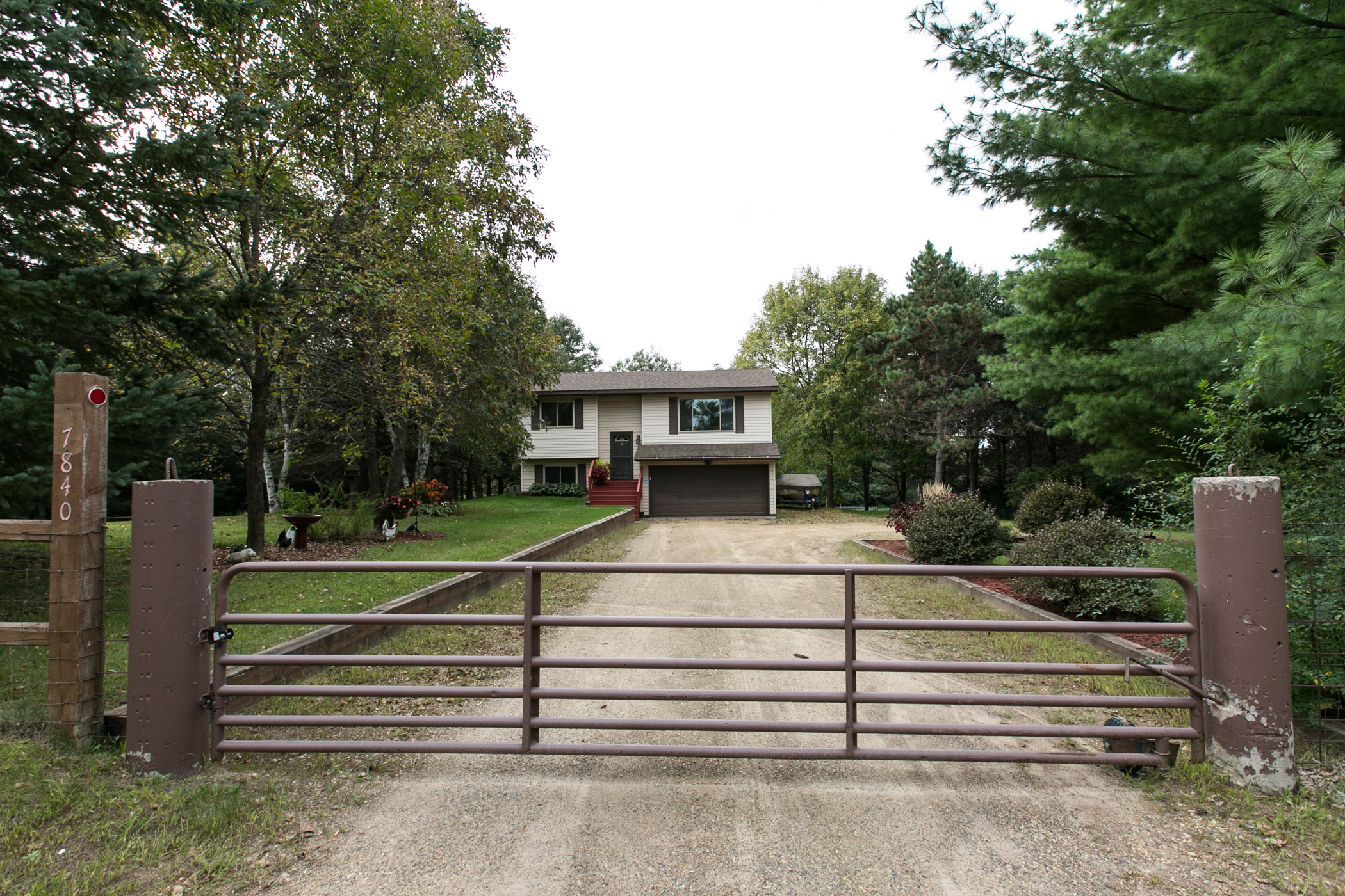 Secluded and private home on 2.5 acres in Stacy! SOLD!! header image.