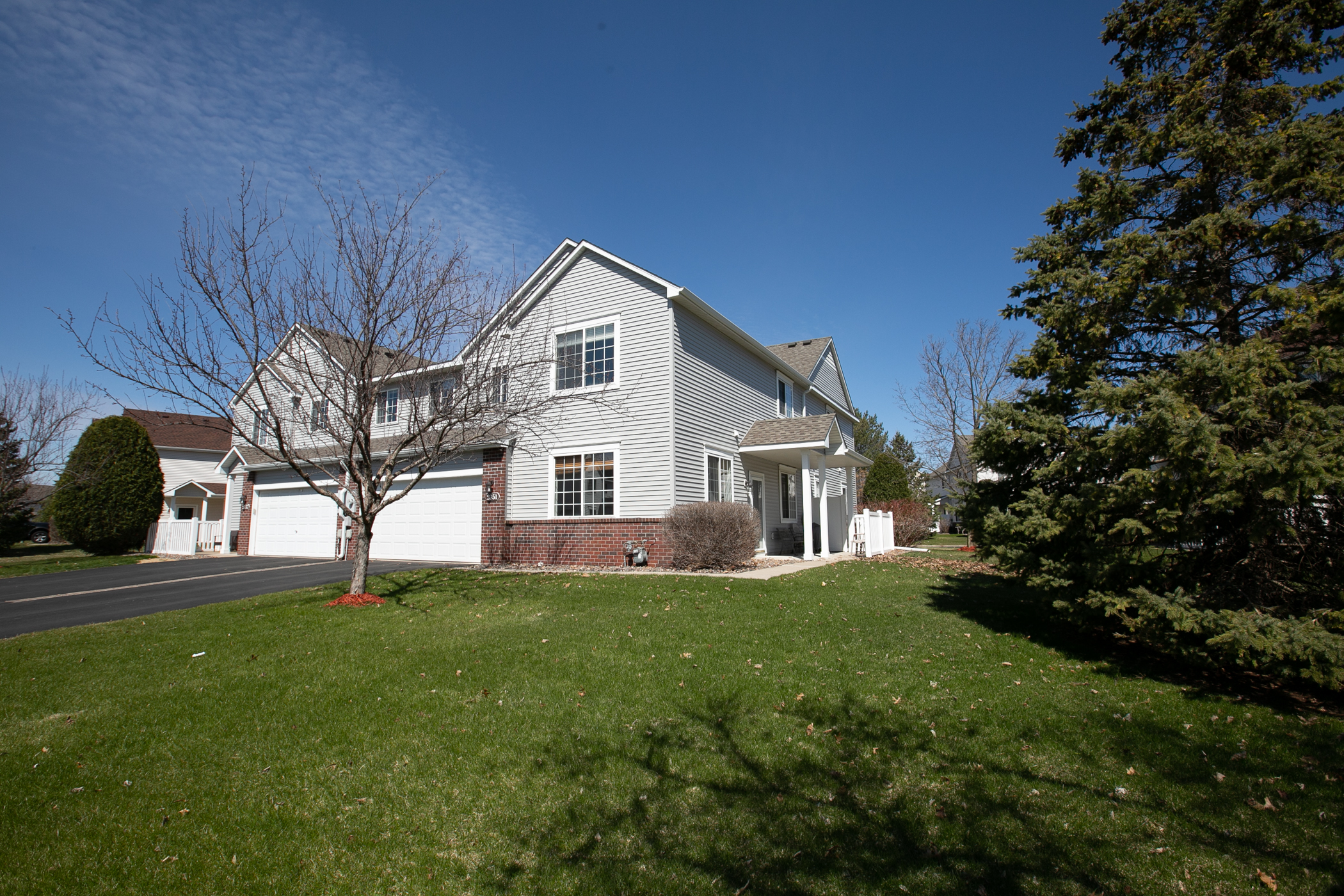 Highly sought after end unit townhome is SOLD in Blaine! header image.