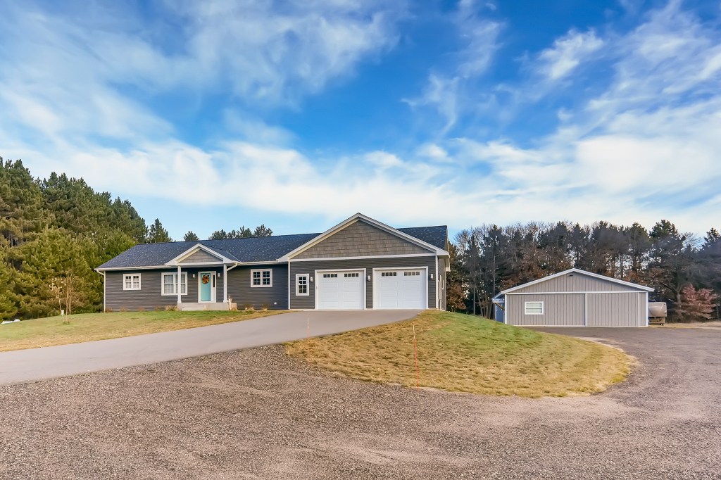 Home for sale in Nowthen on wooded acreage! SOLD!!! header image.