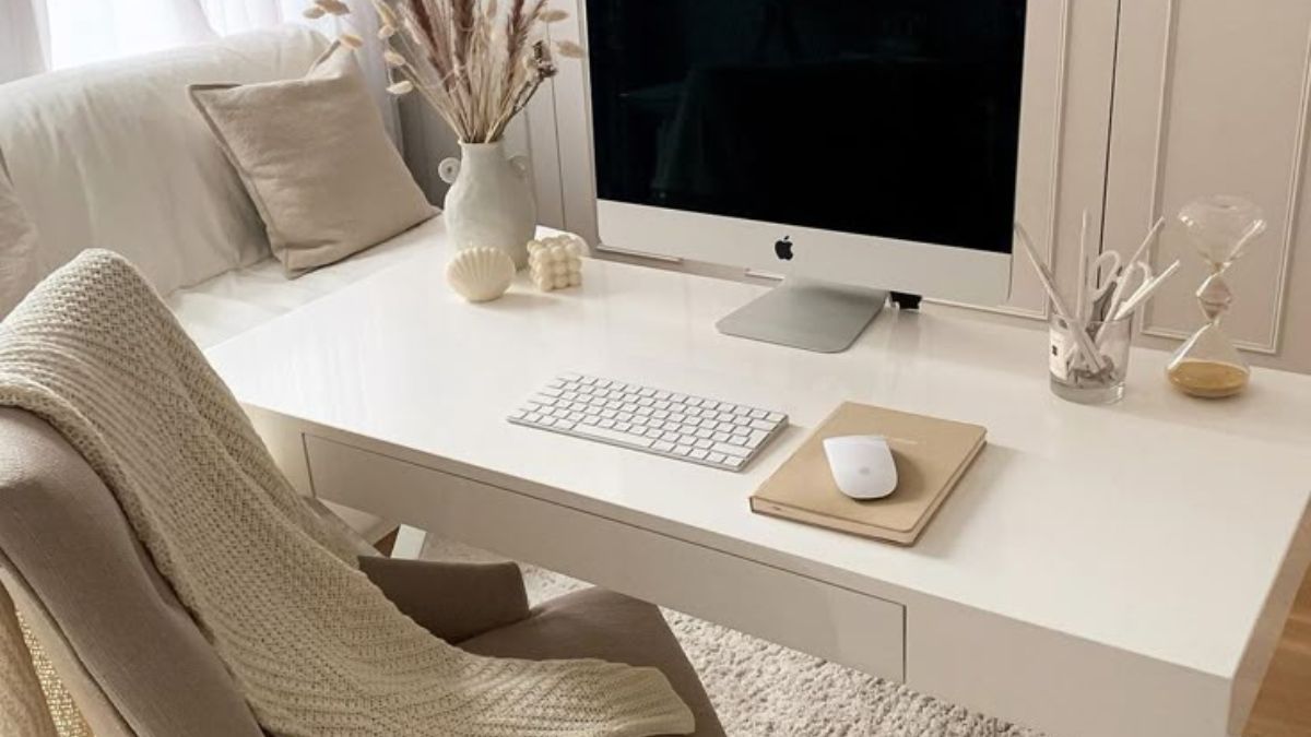 Minimal workspace with notebook and financial papers representing planning and improving credit to qualify for a home purchase in Bakersfield.