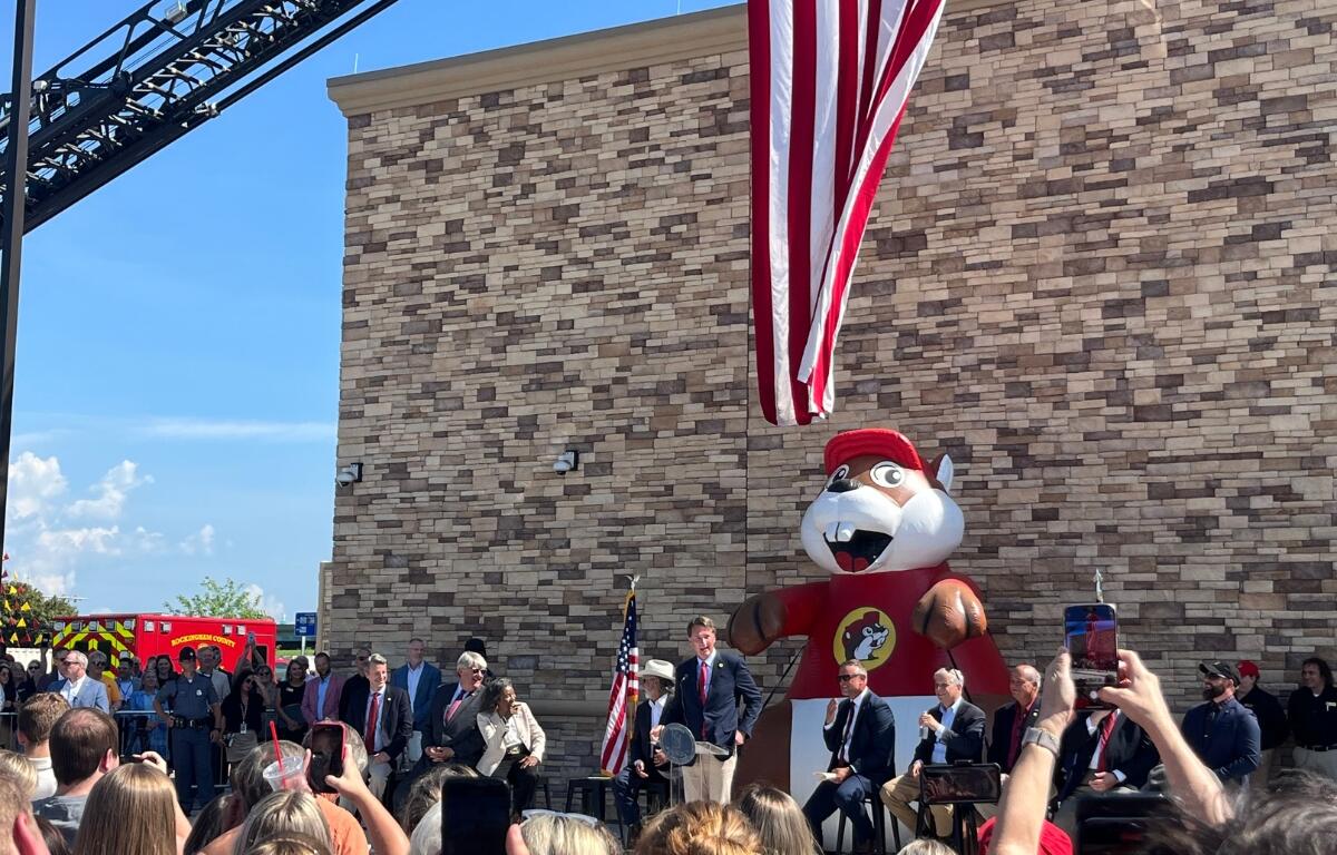 Virginia officials, including Governor Glenn Youngkin, and the Buc-ee's beaver mascot at the groundbreaking ceremony for the Rockingham County location.