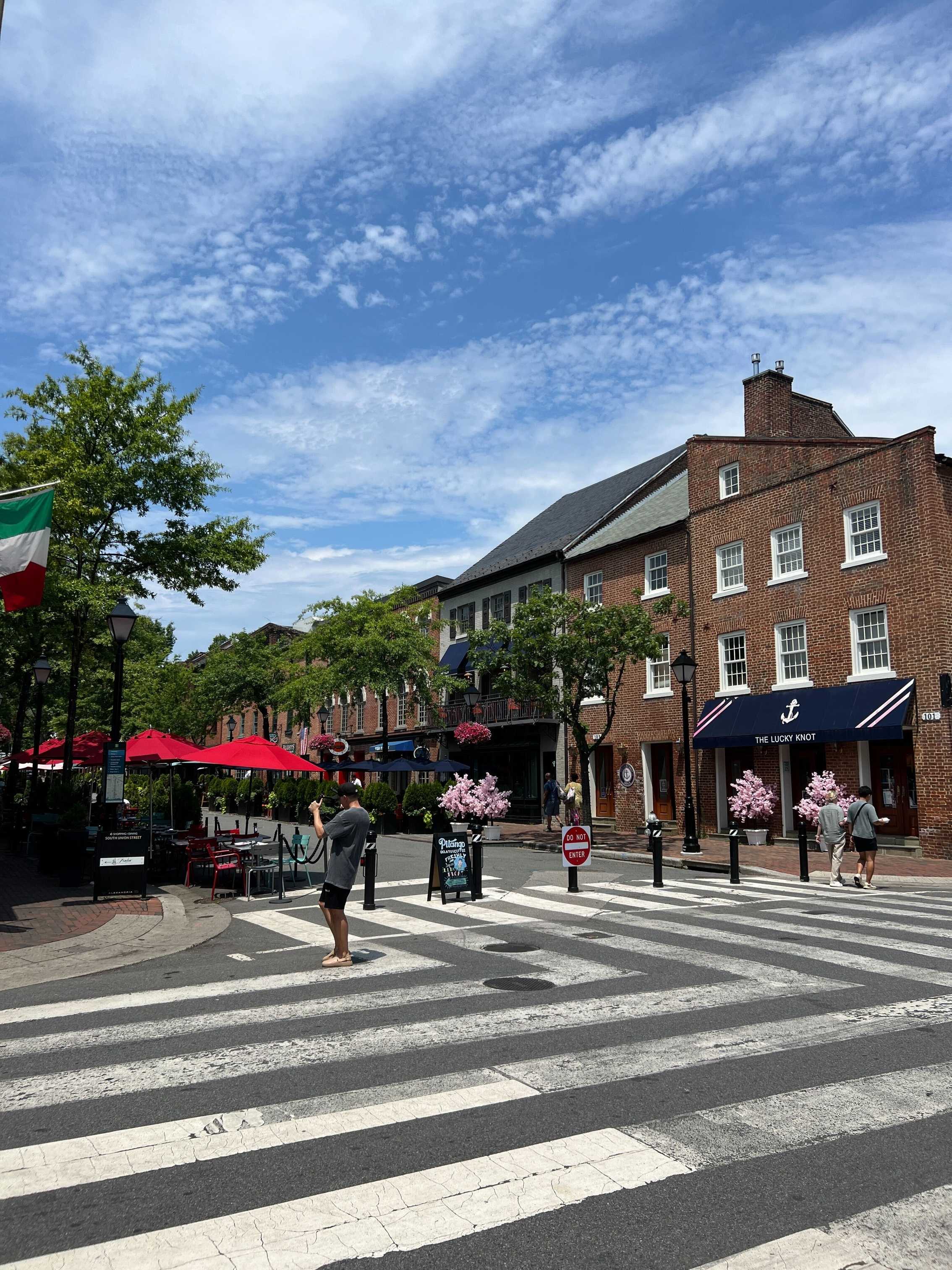 King Street shops and pedestrian crossing in Old Town Alexandria, Virginia; local lifestyle context.