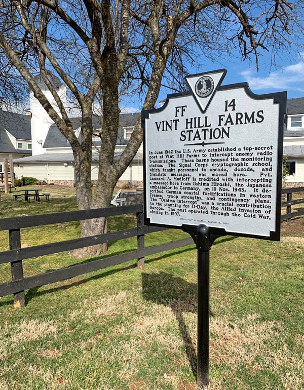 The official historical marker at Vint Hill Farms Station, detailing its secret history as a U.S. Army intercept station during WWII and the Cold War.