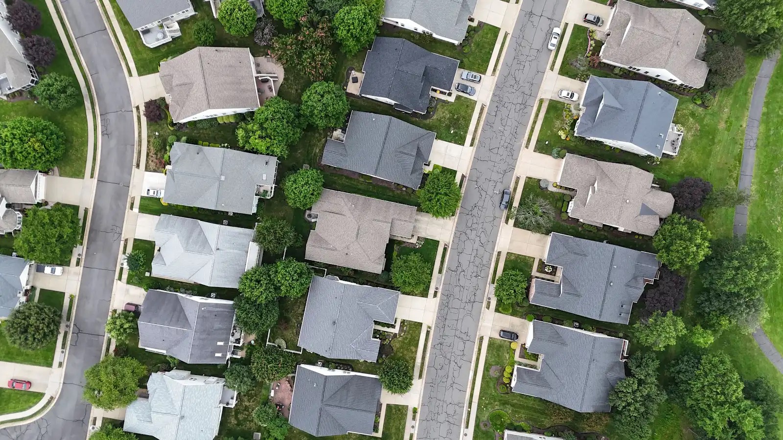 Overhead view of detached homes, yards and streets in Heritage Hunt, Gainesville