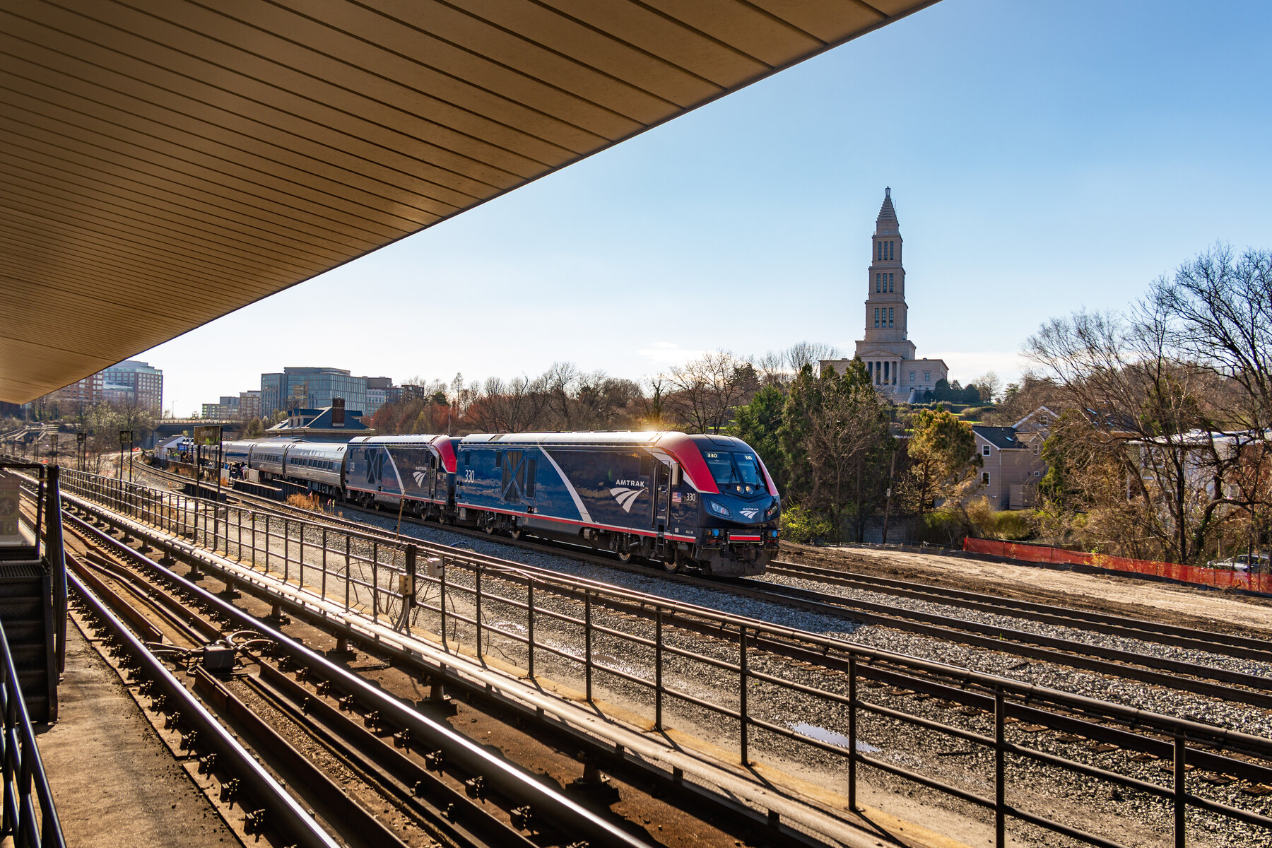 Amtrak train passing King Street–Old Town in Alexandria, Virginia
