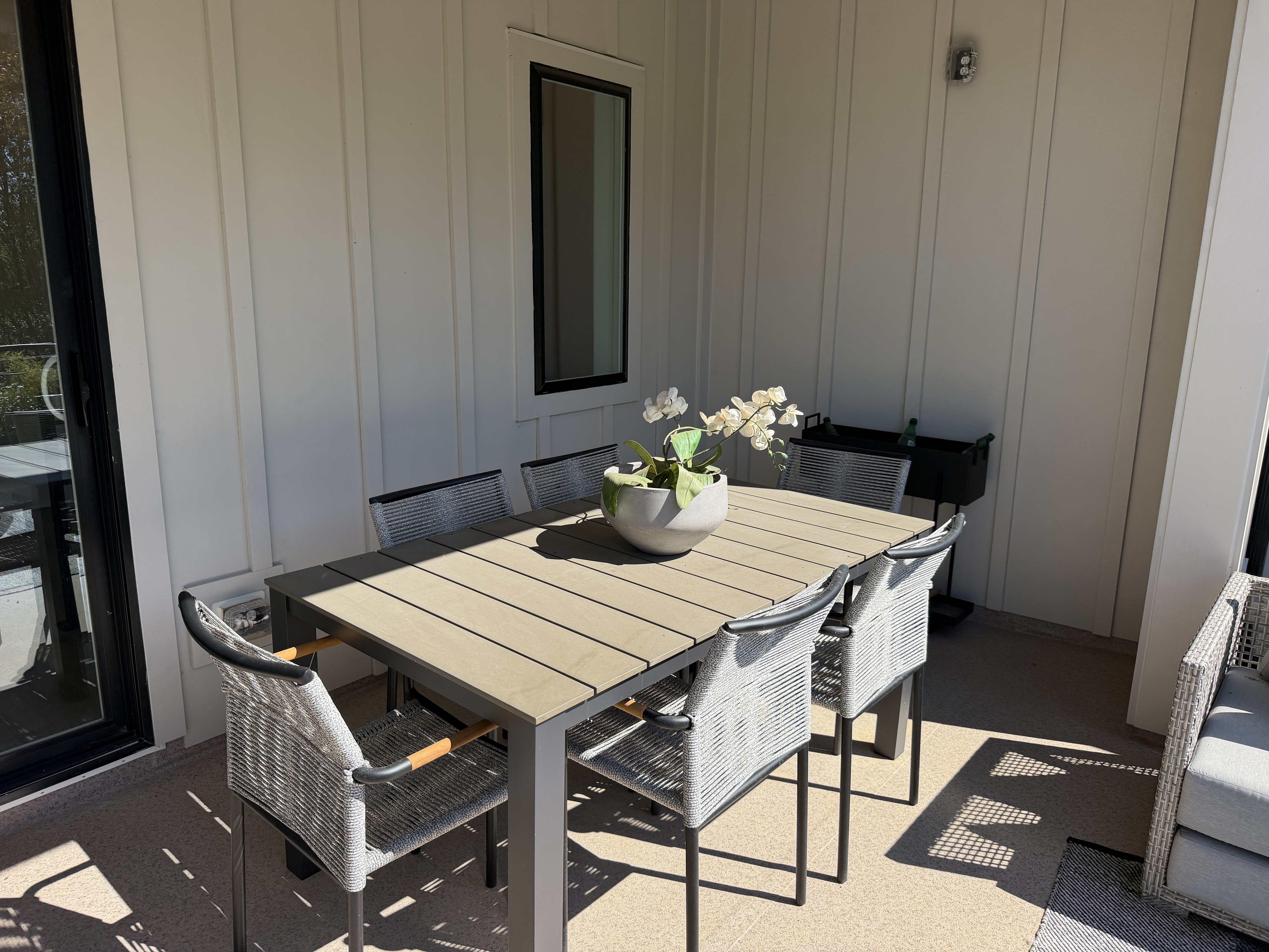 Covered terrace dining area at the Sunset Station model home
