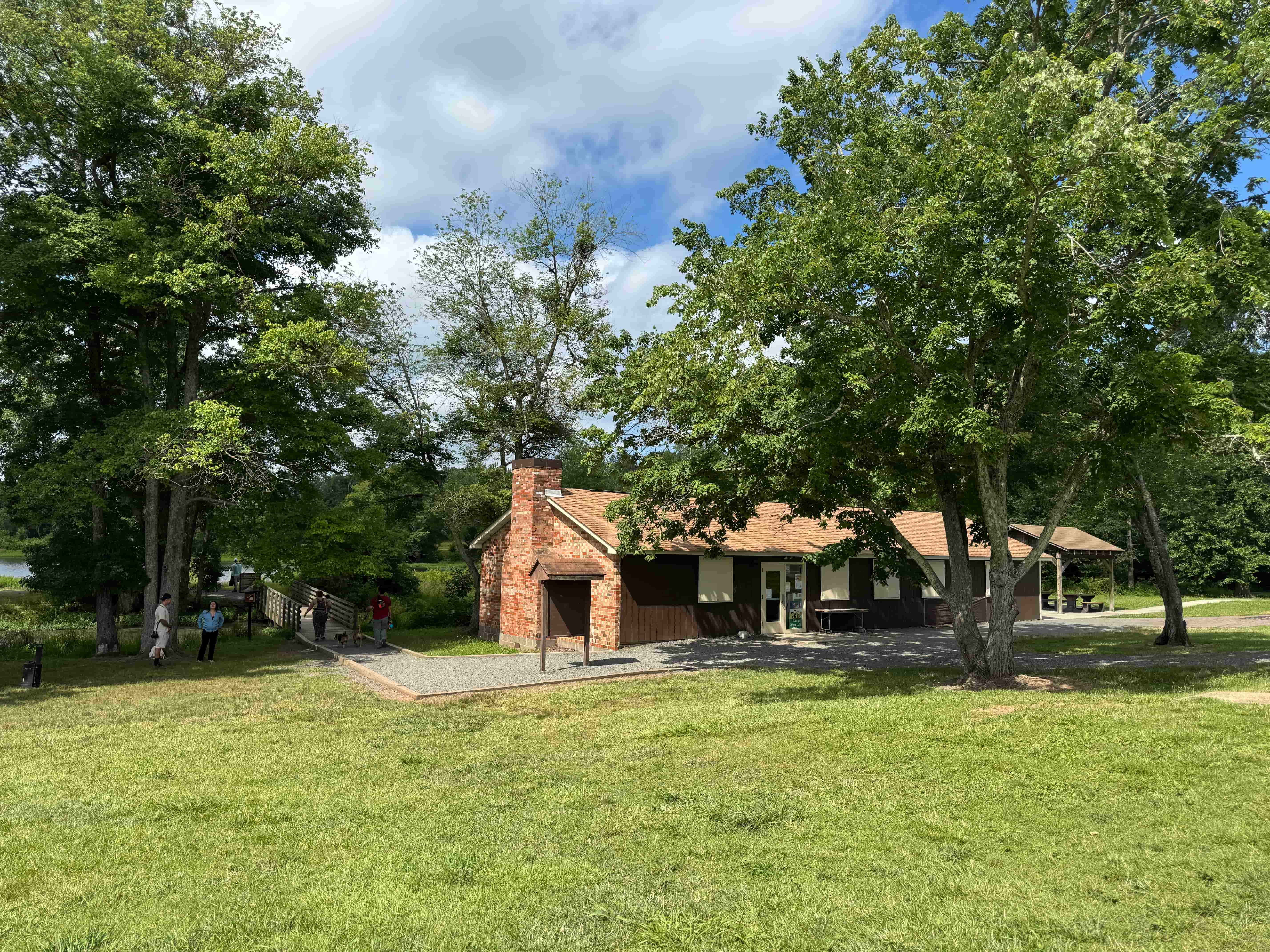 The rustic park building with restroom facilities and picnic area at Silver Lake Park in Haymarket, VA.
