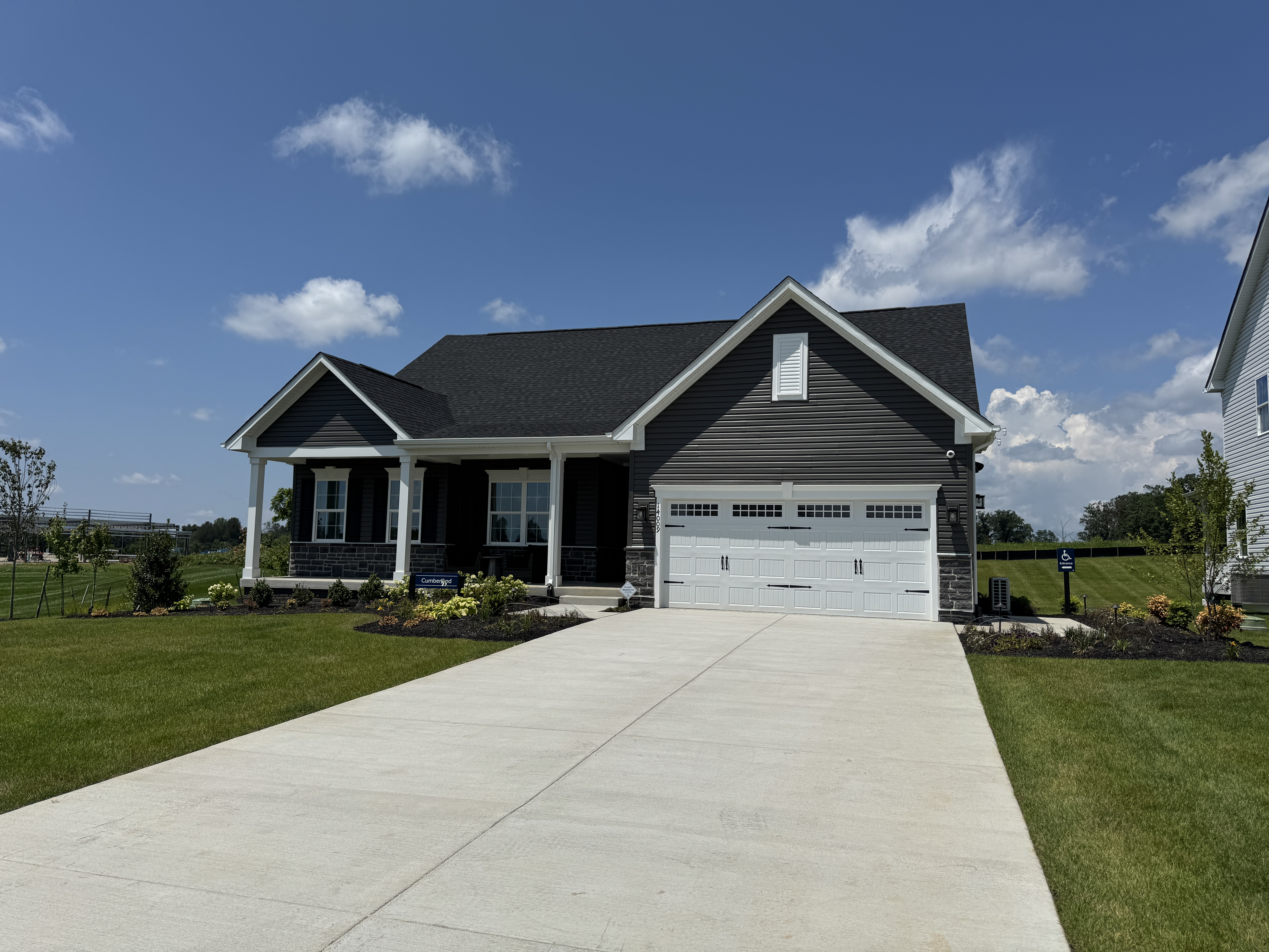 Front exterior of the Cumberland model by Ryan Homes at Kite Acres in Culpeper, VA, a new ranch-style home designed for main-level living.