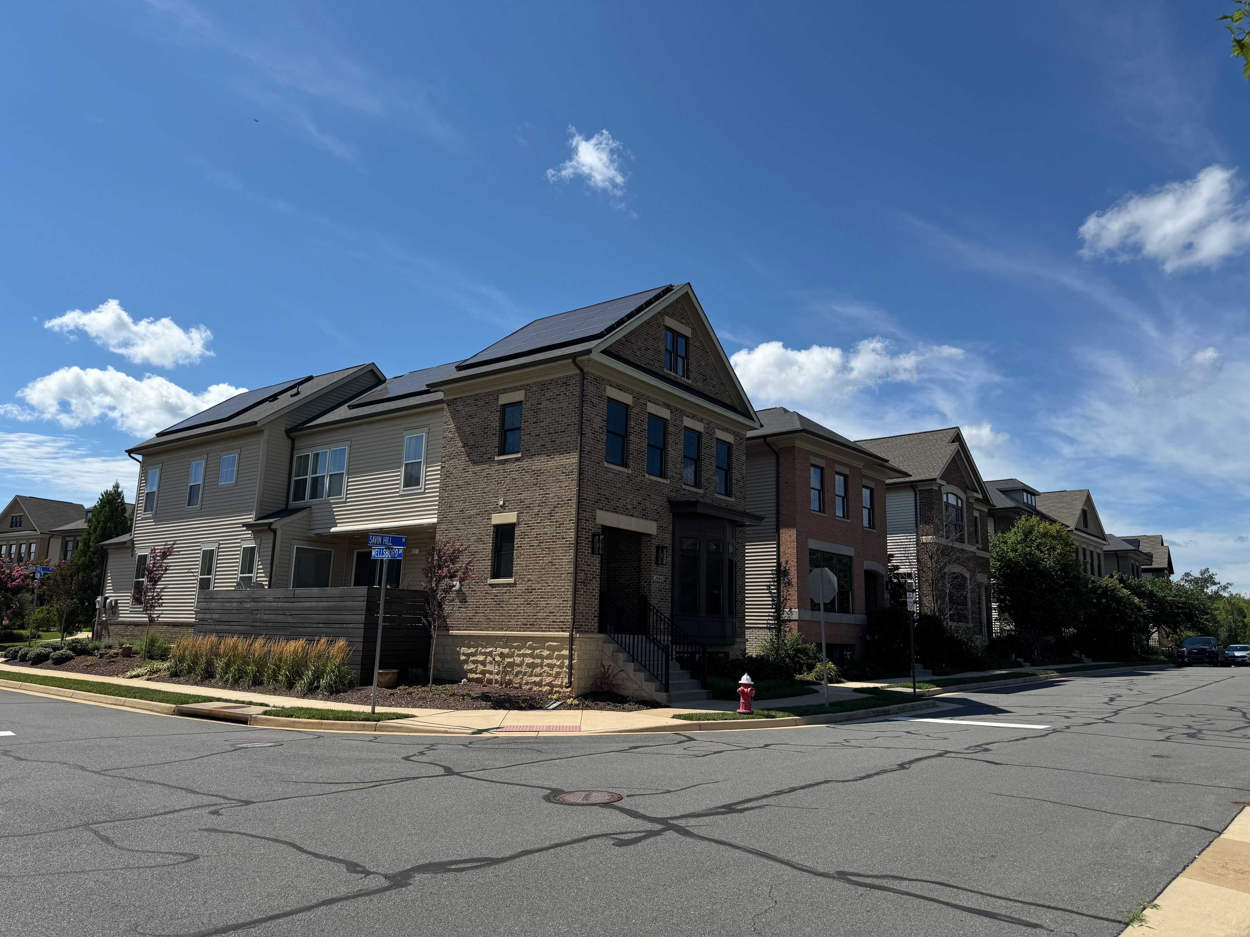 Street-level view of townhomes at One Loudoun in Ashburn, Virginia