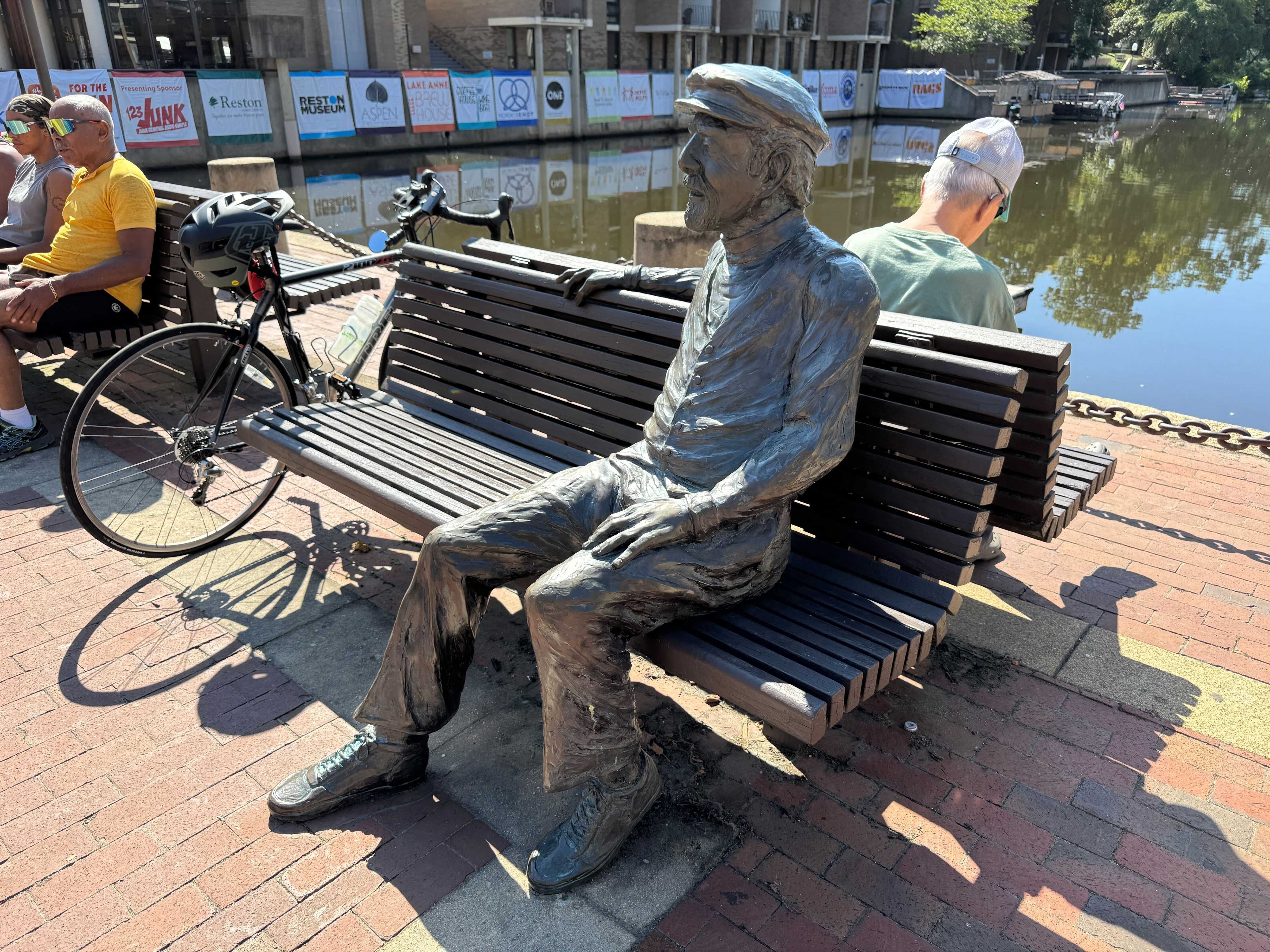 Robert E. Simon statue beside Lake Anne Plaza in Reston, Virginia