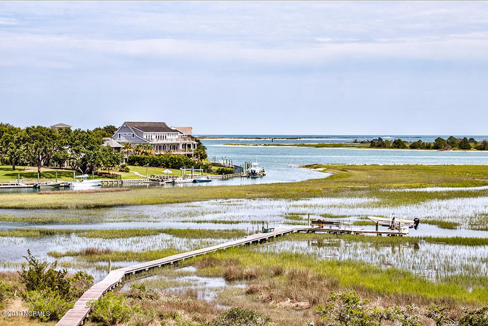 Buying Waterfront Real Estate: a Home with a Dock header image.