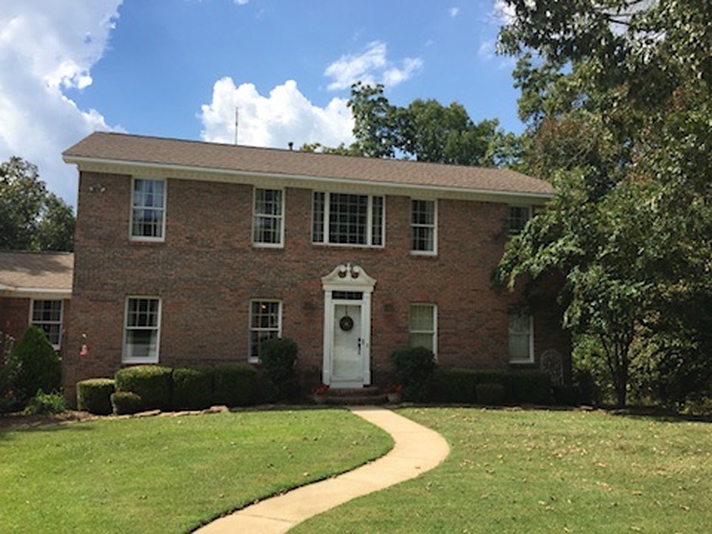 Brick two-story home in Madison County, Alabama that qualifies for homestead exemption