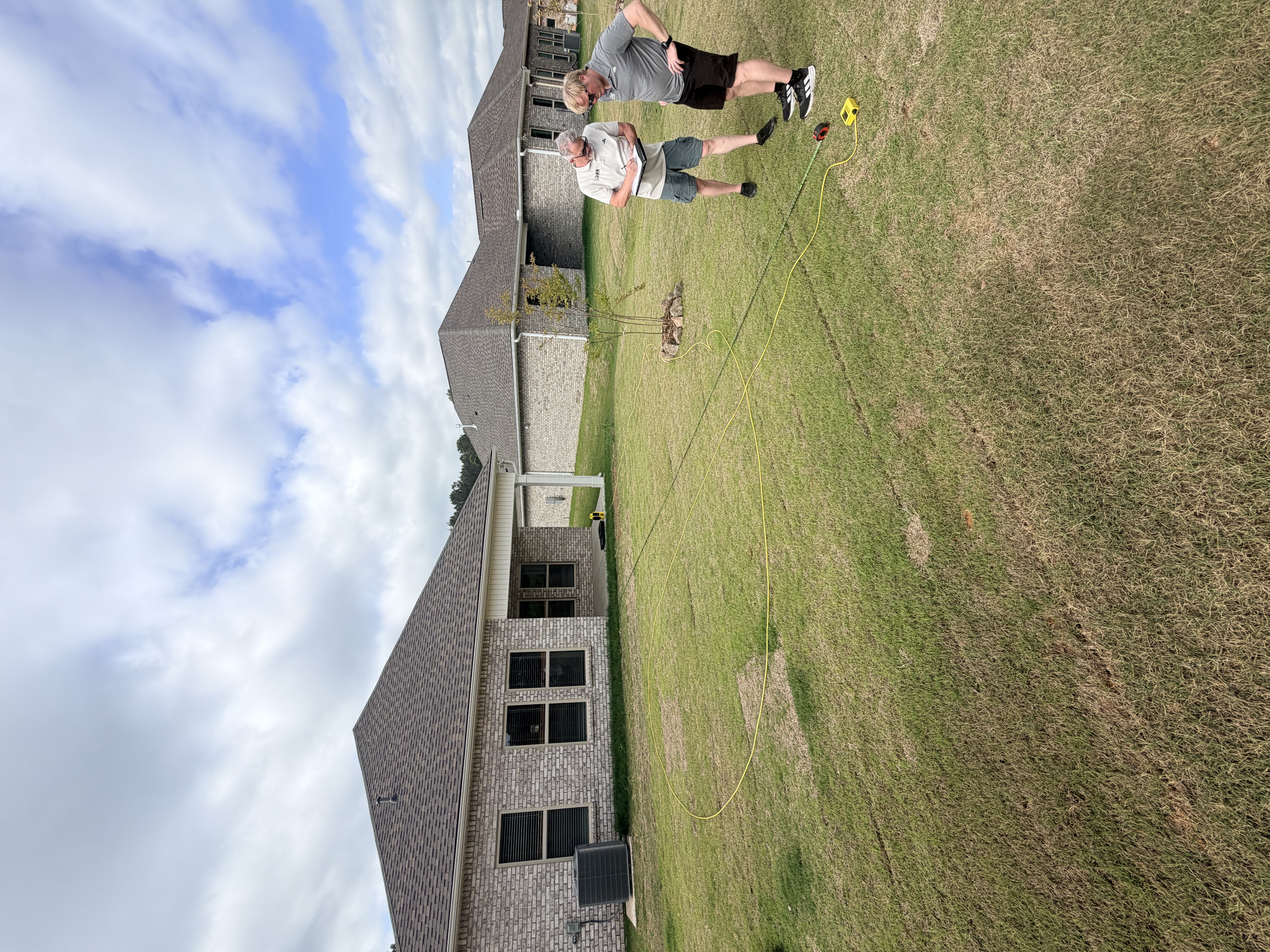 Huntsville Home Inspection measures the slope away from a home in Gurley, AL