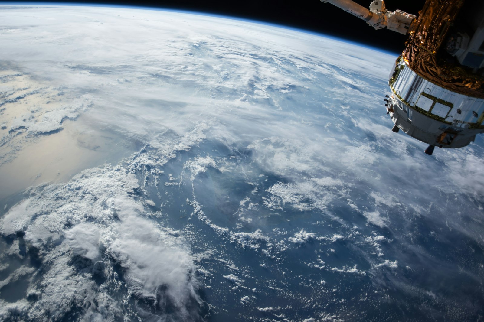 Satellite orbiting Earth representing the U.S. Space Command headquarters relocation to Redstone Arsenal in Huntsville, Alabama