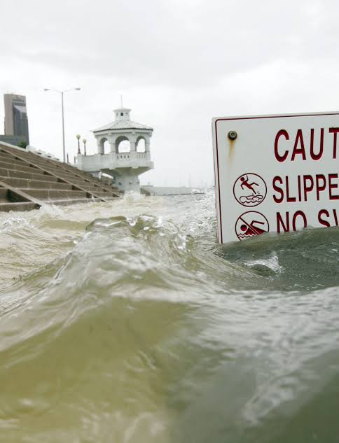 Coastal Bend home buyer reviewing windstorm and flood insurance considerations before purchasing a home