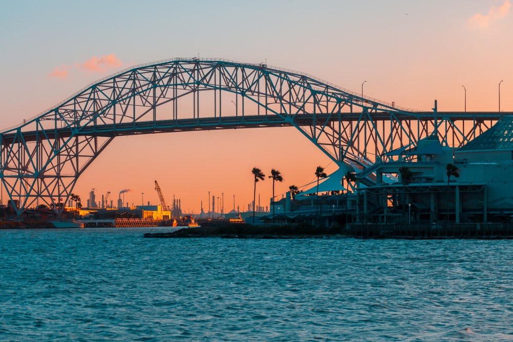 September 2026 Coastal Bend real estate market update featuring Corpus Christi waterfront skyline and neighborhood homes