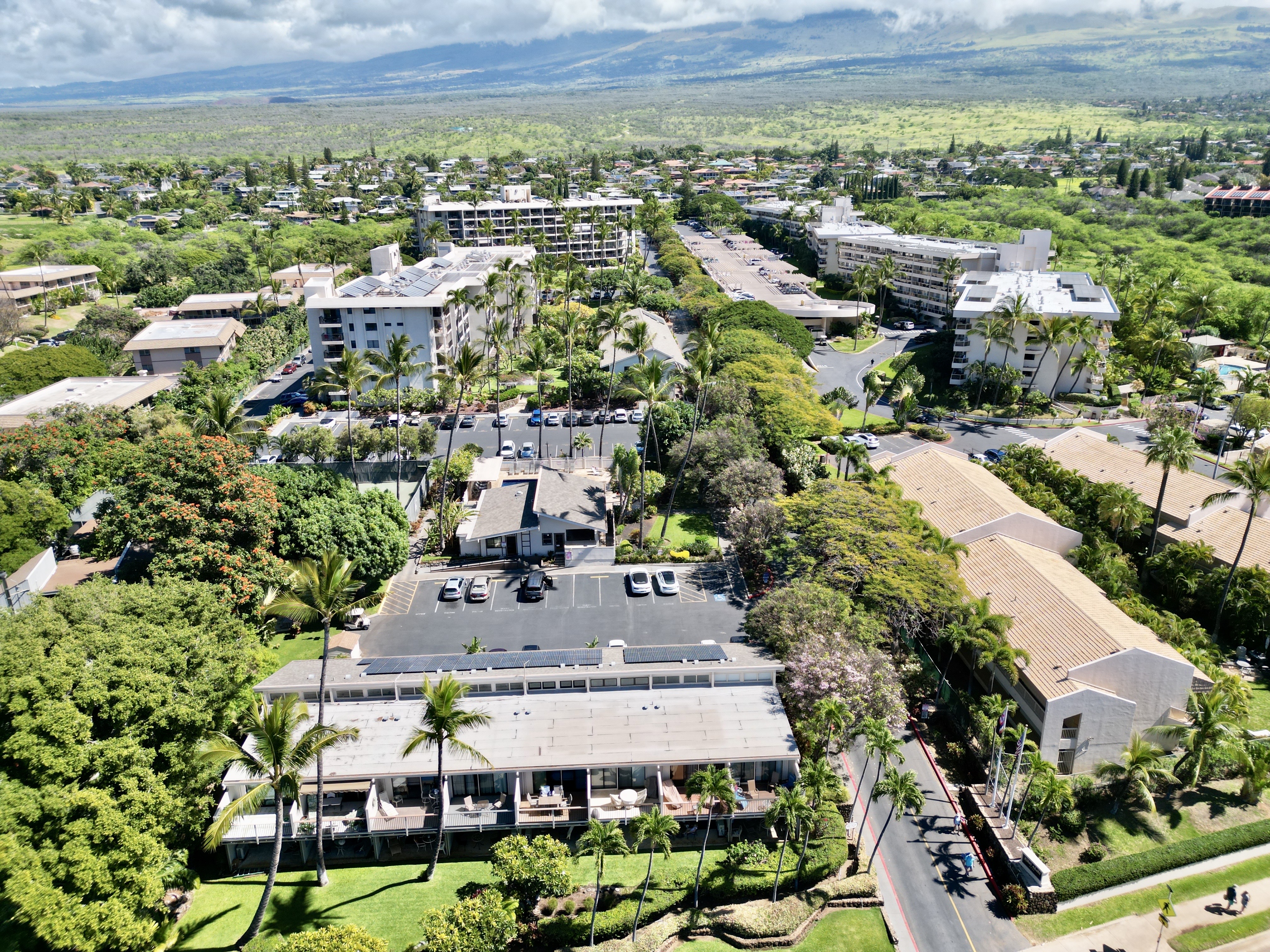 Ocean view of Kihei Akahi condominium complex in South Maui, located across from Kamaole Beach Park