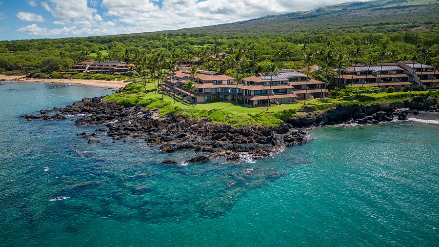 Aerial view of Makena Surf oceanfront condos along the Makena coastline in South Maui.