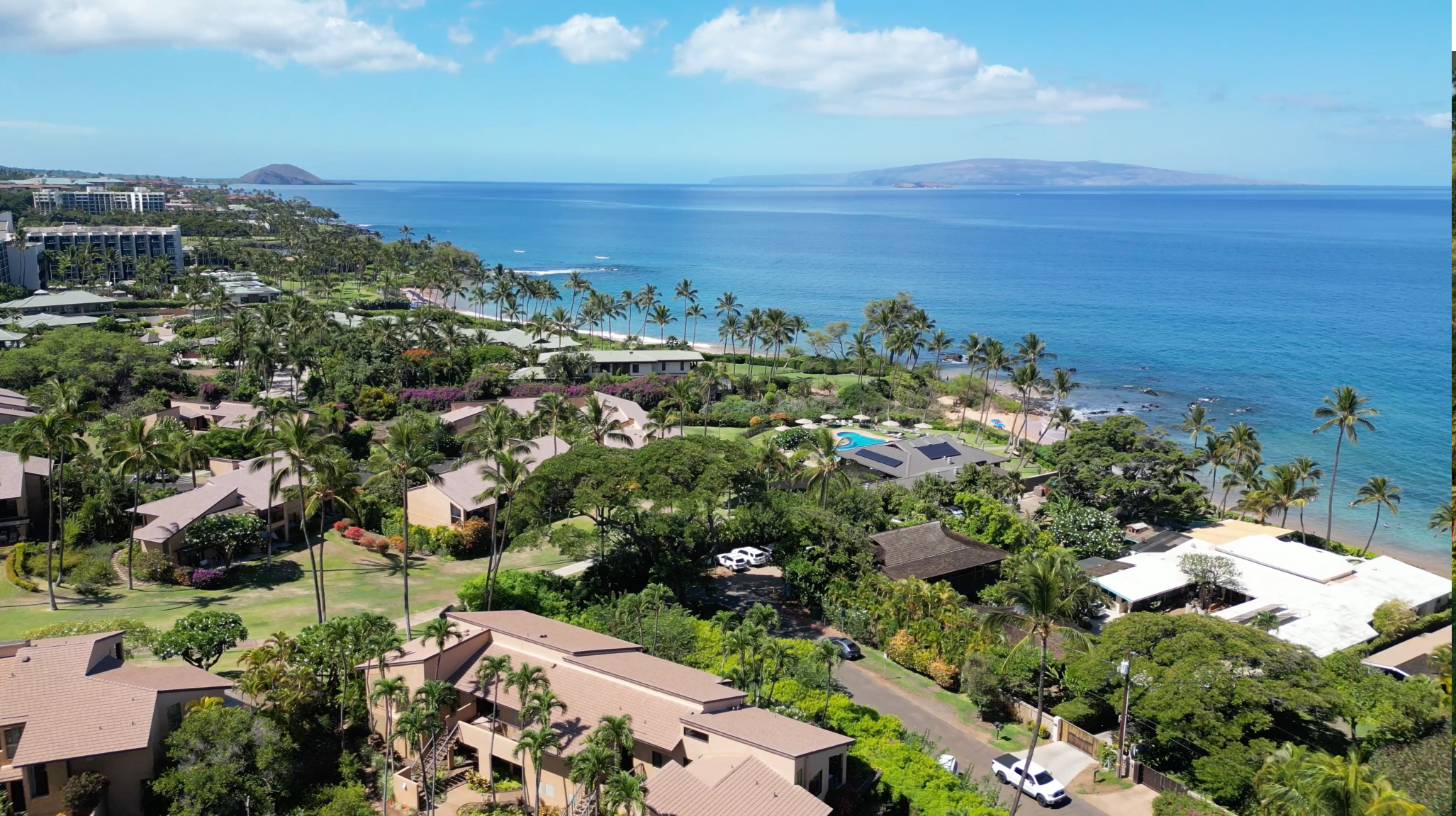 Panoramic ocean view from Wailea Ekahi condo lanai overlooking Keawakapu Beach, Maui.