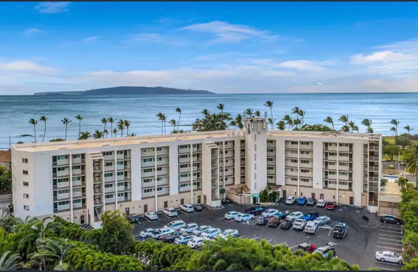 Island Surf condominium building in Kihei across from Kalama Park, offering walkable South Maui condo living near beaches, surf, dining, and oceanfront recreation.