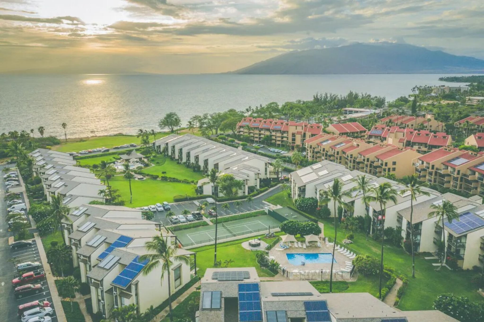 Hale Kamaole condos for sale with ocean views and pool area in South Kihei Maui.