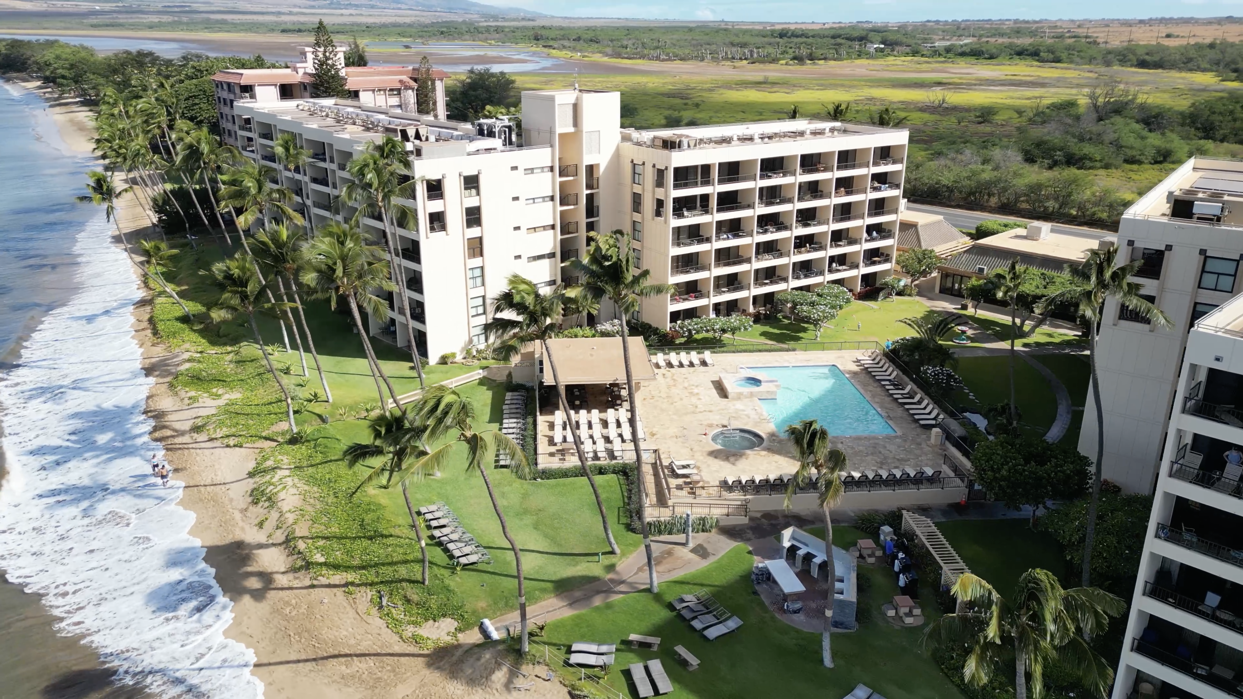 Sugar Beach Resort oceanfront condos in North Kihei, Maui, with direct beach access and views of West Maui mountains.