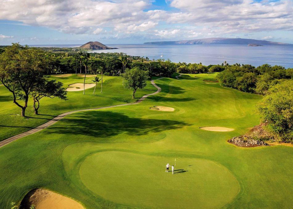 Ocean-view golf course in Wailea featuring tropical landscaping and championship golf on Maui.