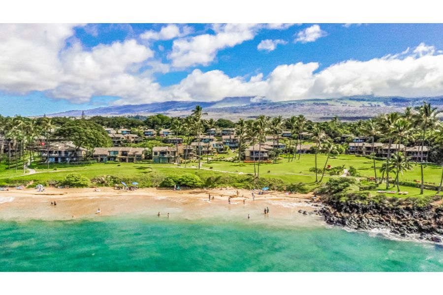 Aerial view of Wailea Elua Village beachfront condos on Ulua Beach in South Maui.