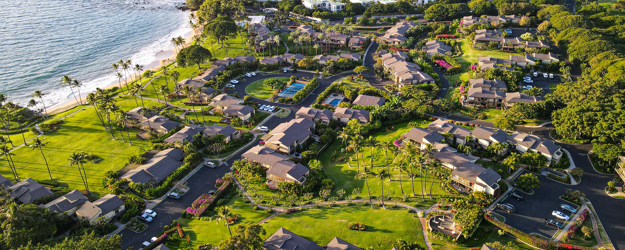 Aerial view of Wailea Elua Village oceanfront condos along Ulua Beach in Wailea Maui