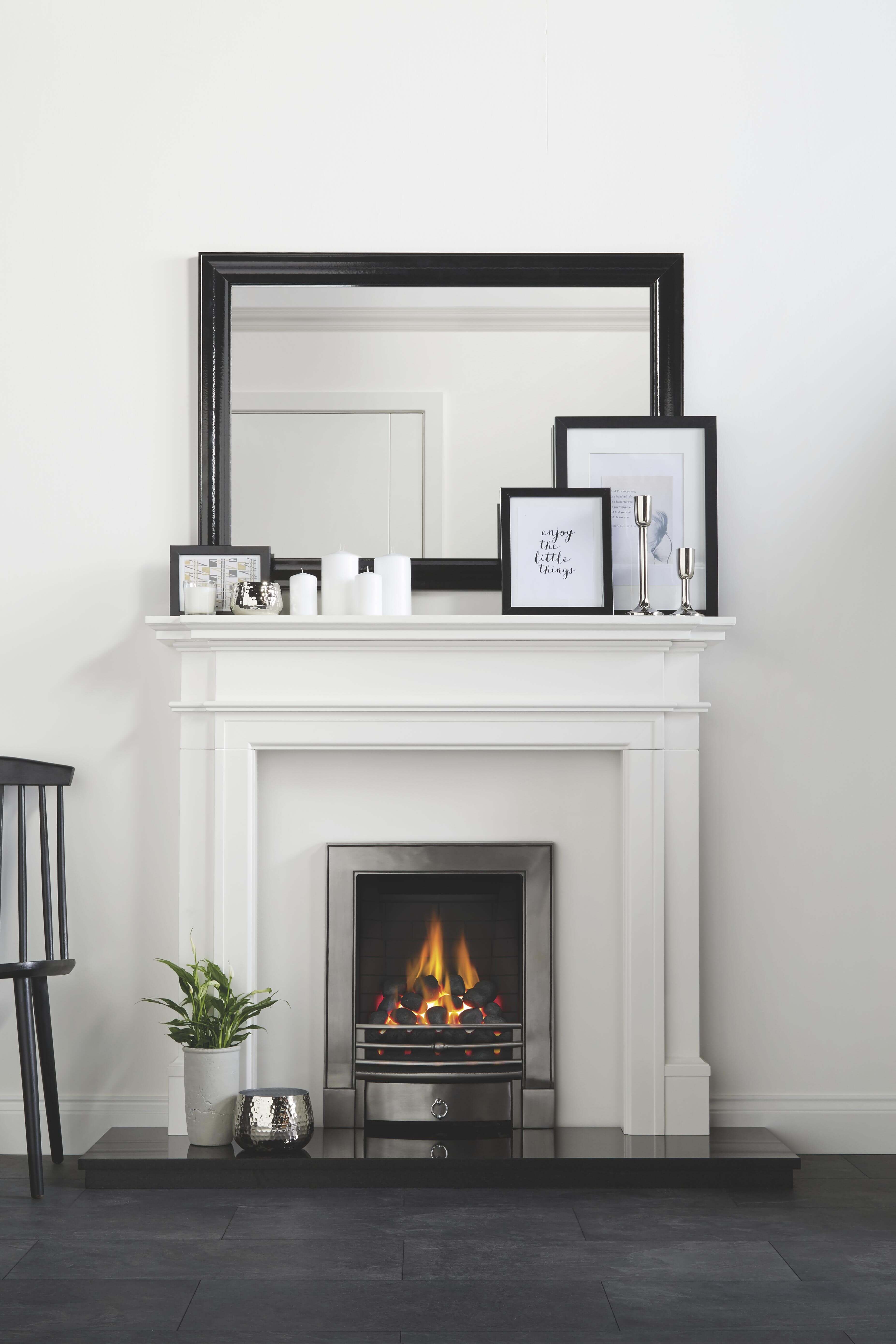 Staged Mantle with Pictures and Candles
