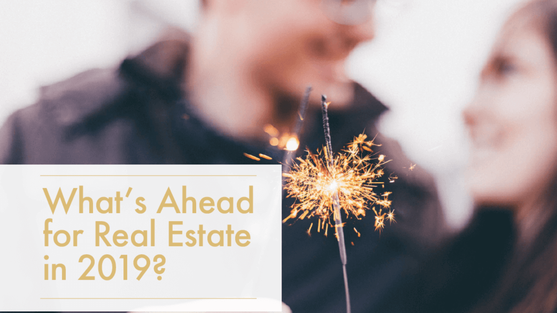 Couple holding a sparkler