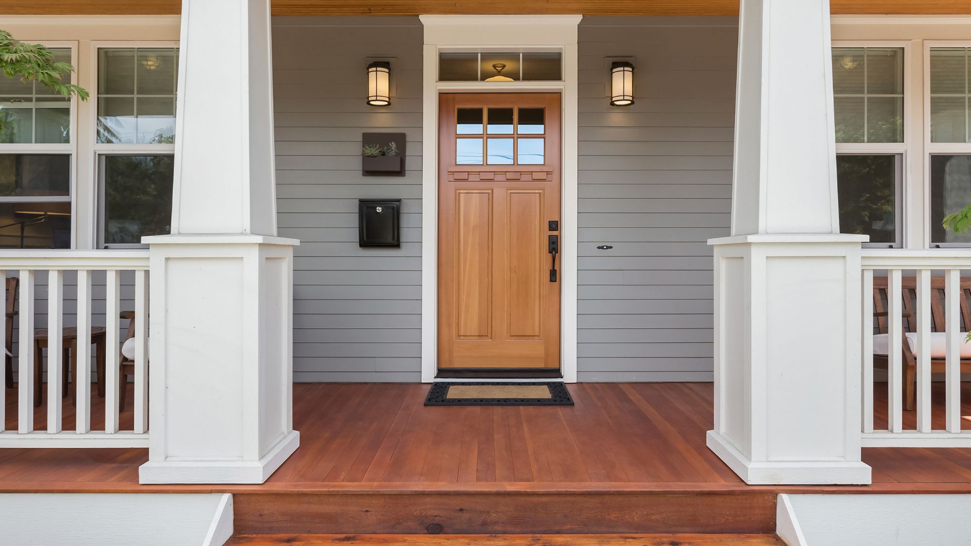 Front Porch of a Home with Soft Grey Siding 