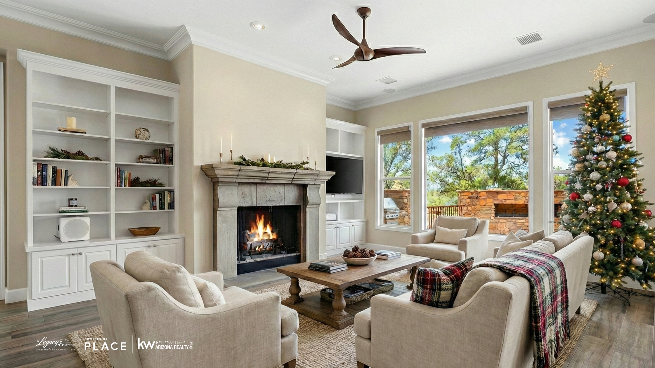 Cozy living room staged for sale in Prescott AZ with subtle holiday decor and fireplace.