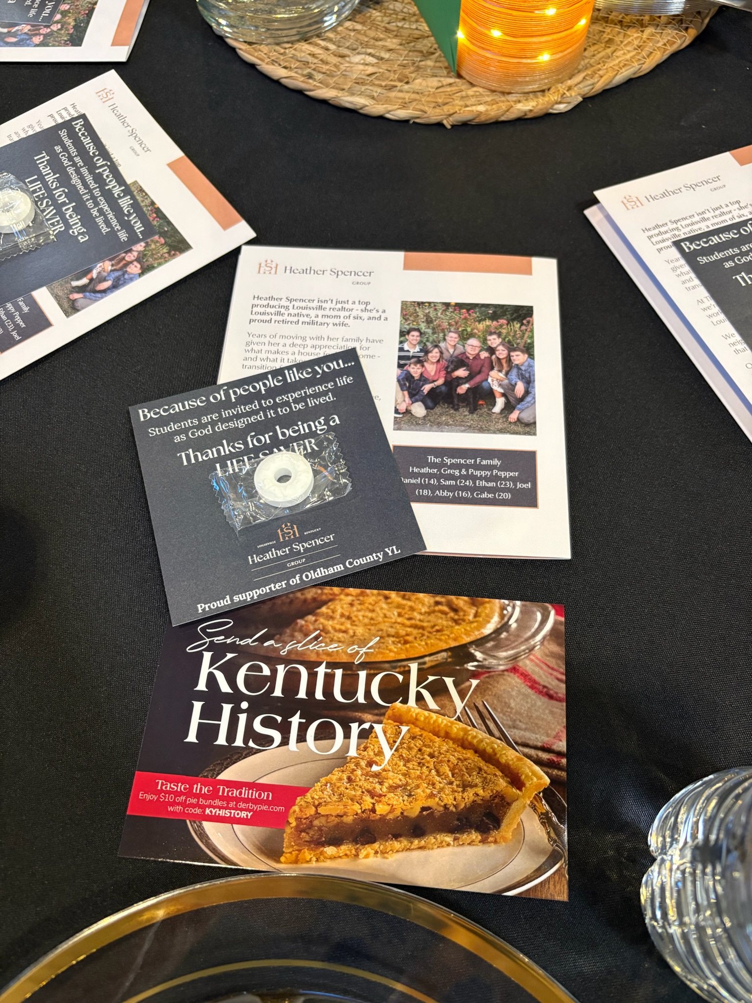 Branded mint giveaway cards placed on a banquet table as a simple marketing idea for realtors and event sponsorship