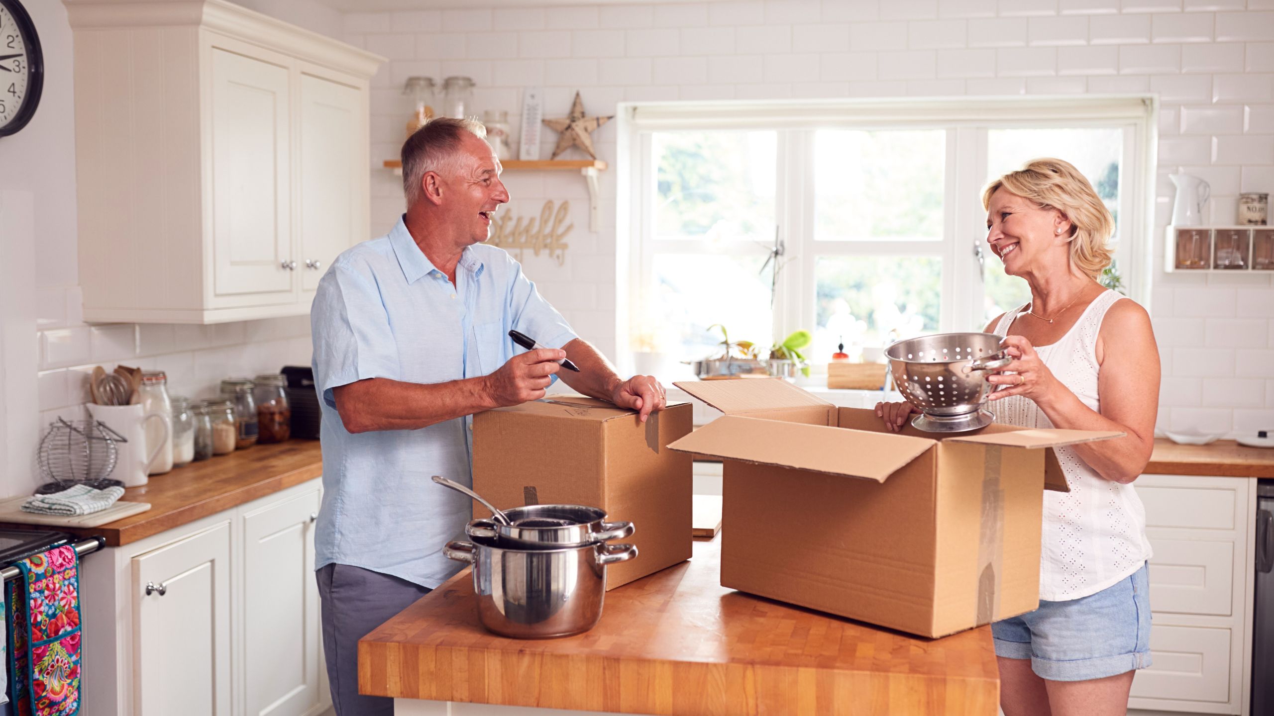 A mature couple Decluttering