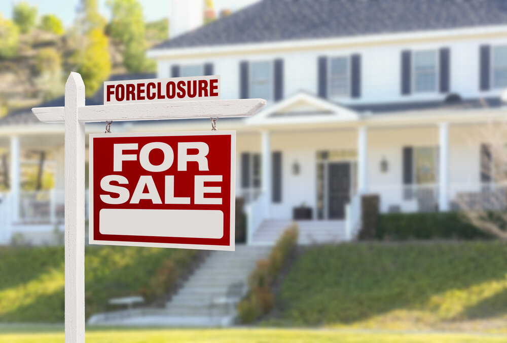 Thinking About Buying a Foreclosure? header image.