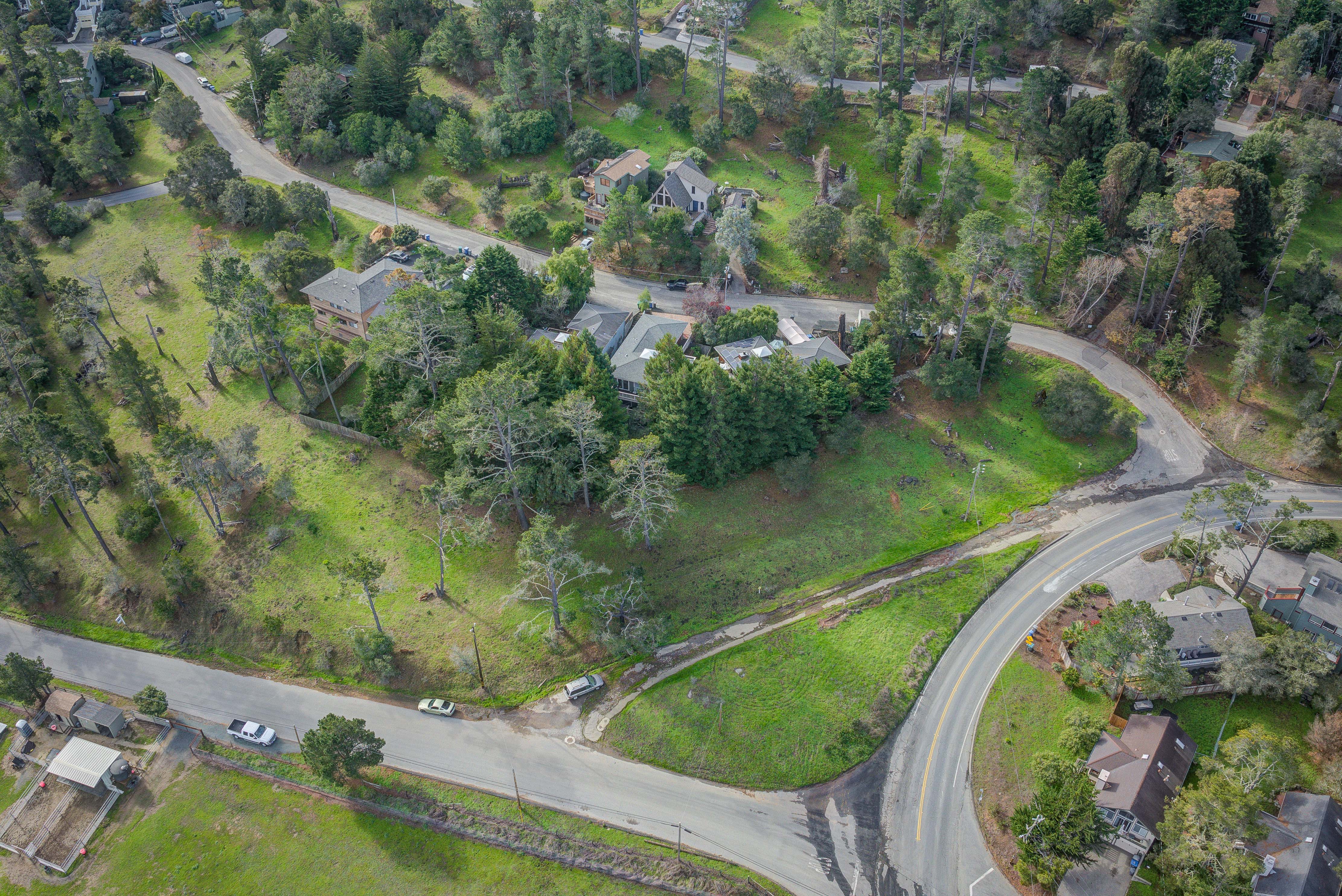$1,100,000 1981 Green St. Cambria, CA 93428 1.25 Acres | Multifamily Zoning | Water Meters Included header image.