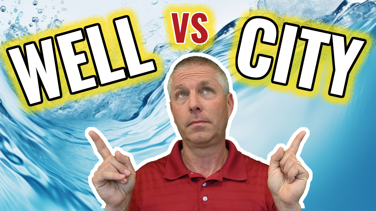 water with Chuck pointing to well vs city