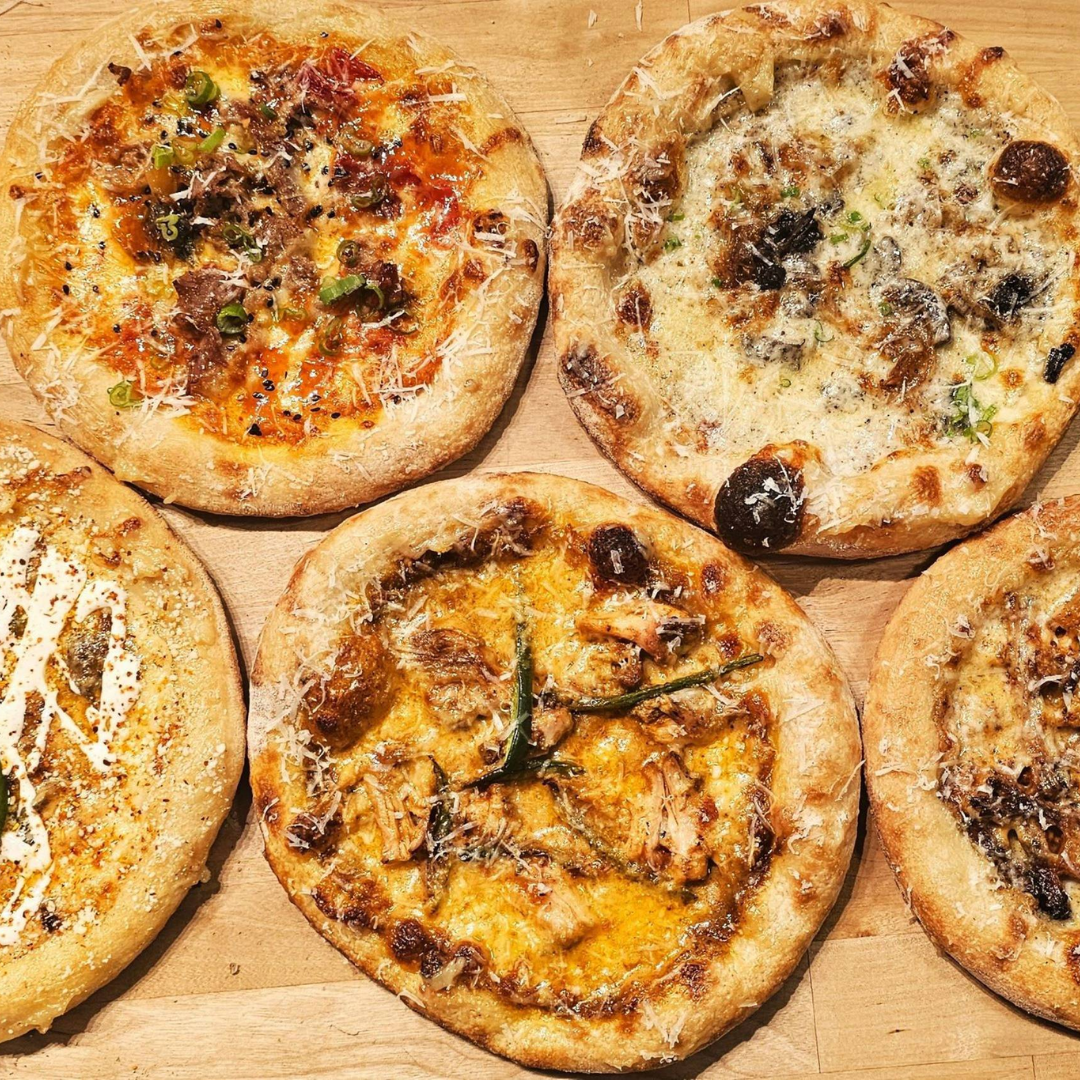 Find the International Flavors of Pizza at McGinley Square header image.