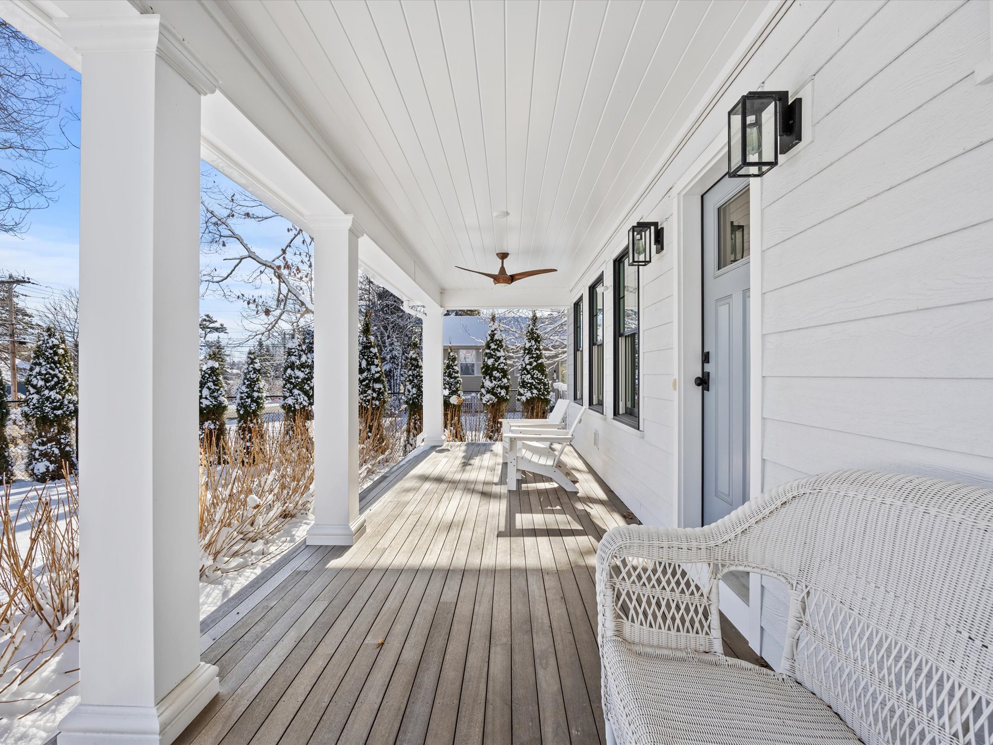 Coastal maine real estate listing front porch in the snow