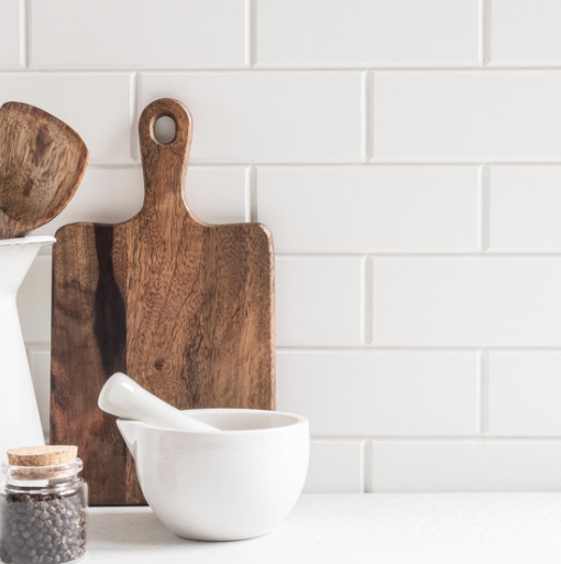 19 Clever Design Tricks to Make a Small Kitchen Look Larger header image.