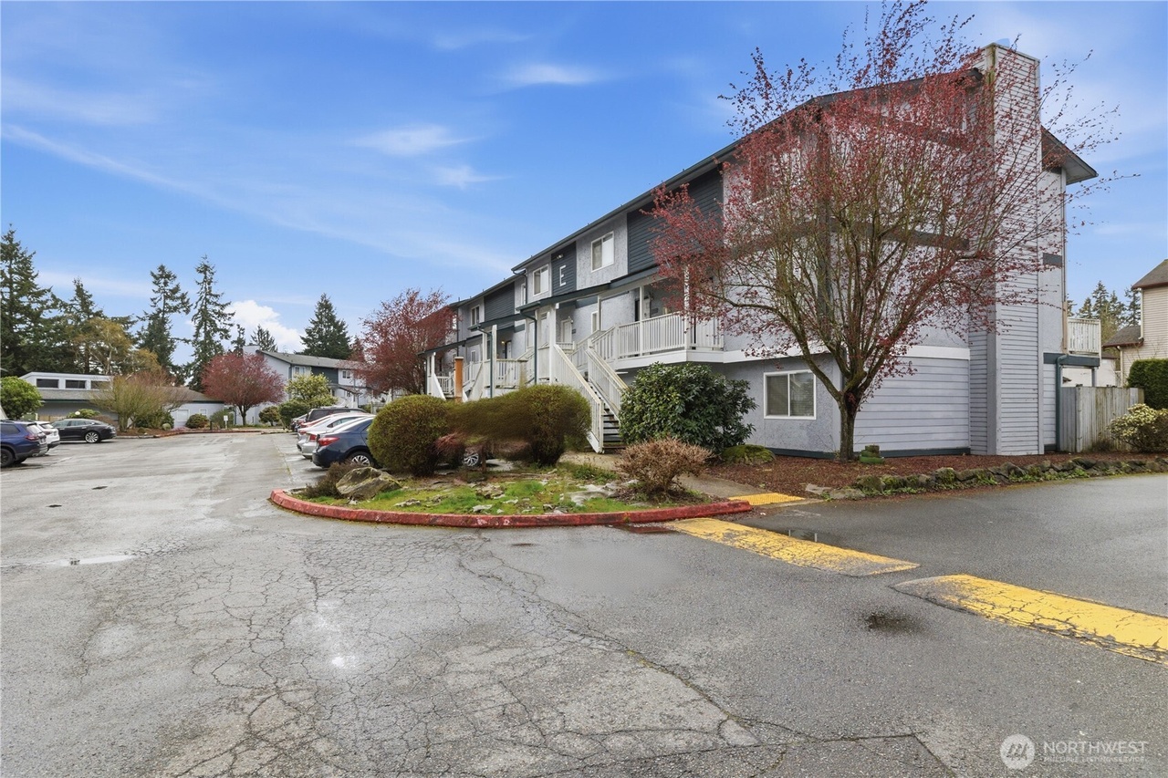 Light filled end unit condo with strong upside and flexible living header image.