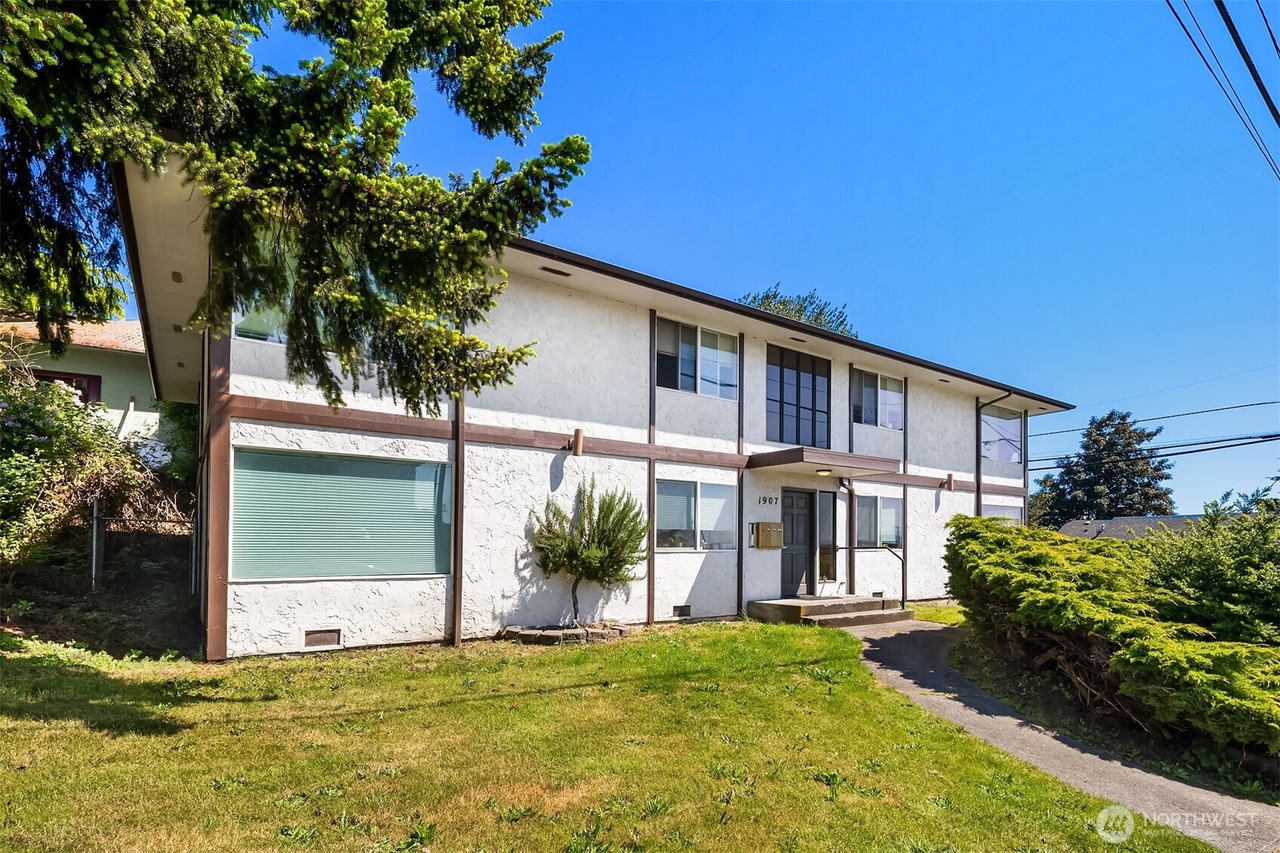 Turnkey Everett 4-Plex with Strong Rental History and Value-Add Potential header image.