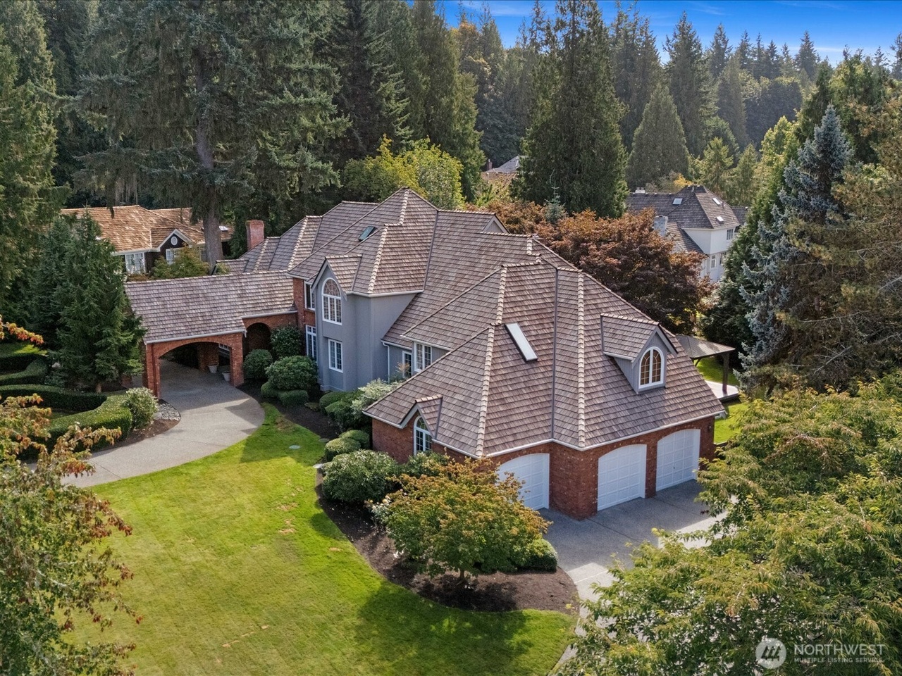 Behind the Columns at Gun Shy Ridge: A Redmond Manor of Scale, Privacy, and Design header image.