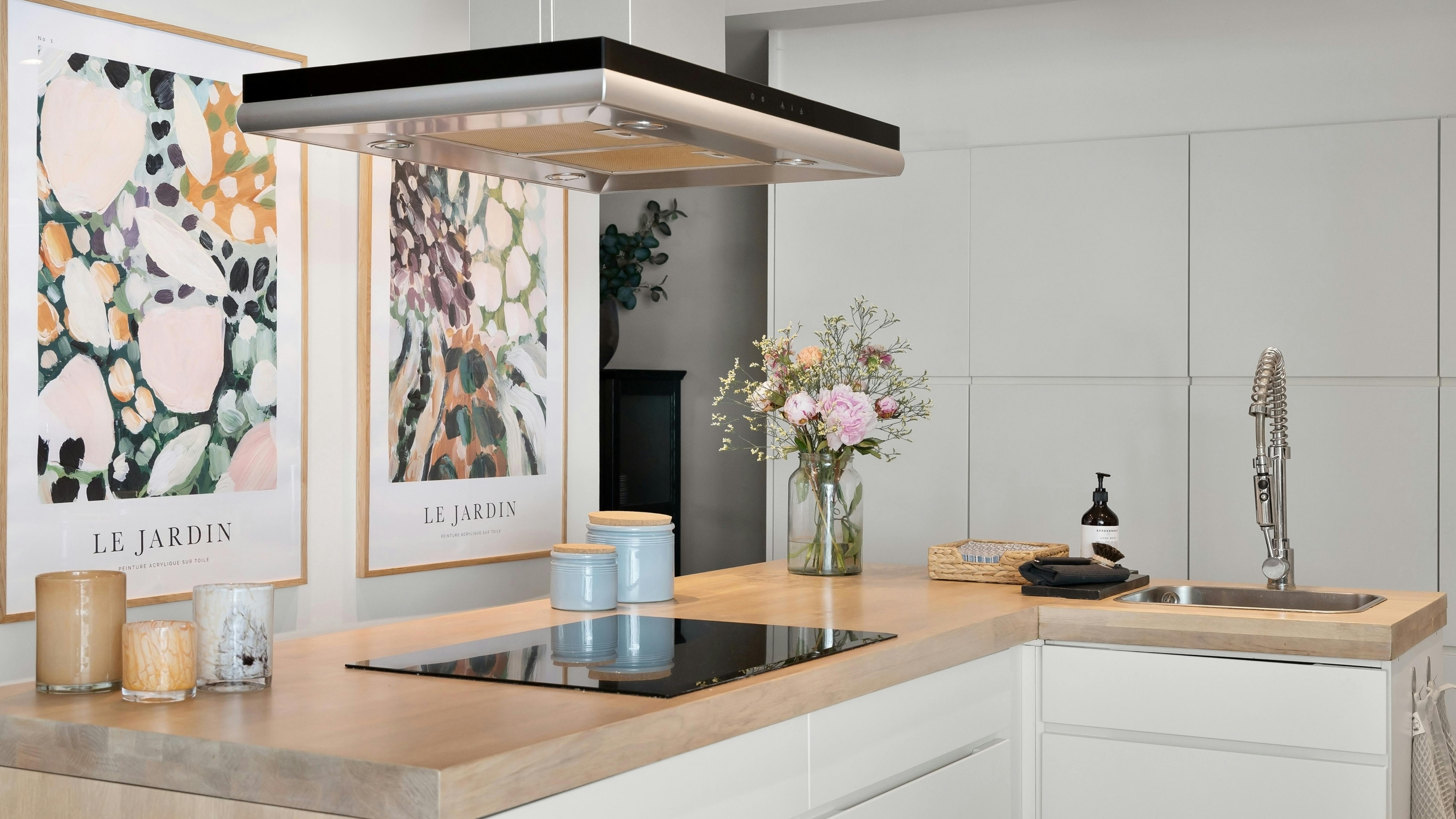 Kitchen with artwork on the wall