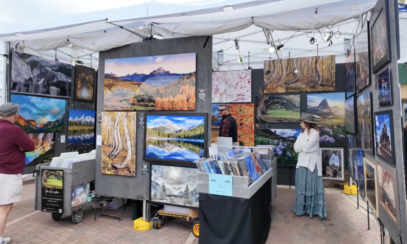 Estes Park Art Market in Bond Park with artist booths and mountain views during Memorial Day weekend