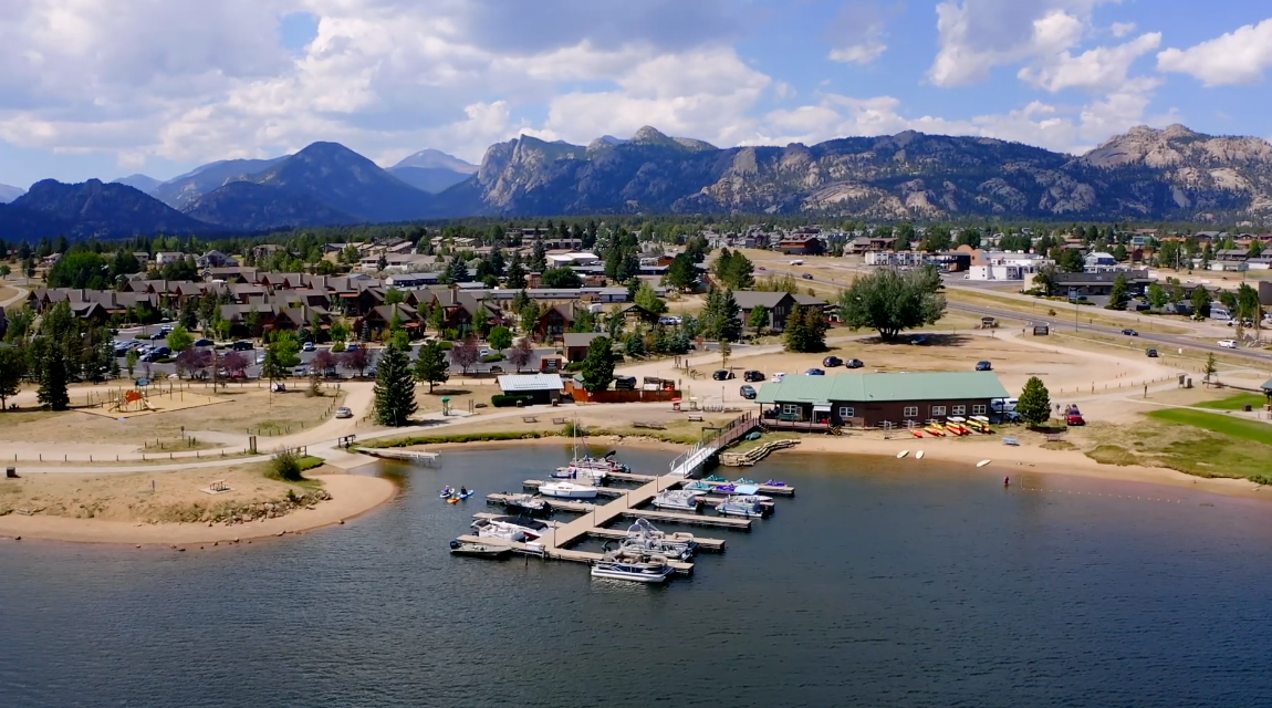 Lake Estes Marina in Estes Park with pontoon boats and mountain views