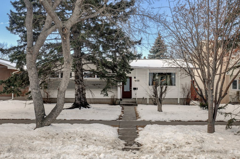 Sun Filled Bungalow with South Facing Backyard at 3835 Varsity Drive NW header image.