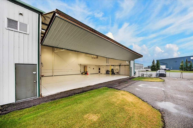 Just Listed: Rare Springbank Airport Hangar Ownership Opportunity header image.