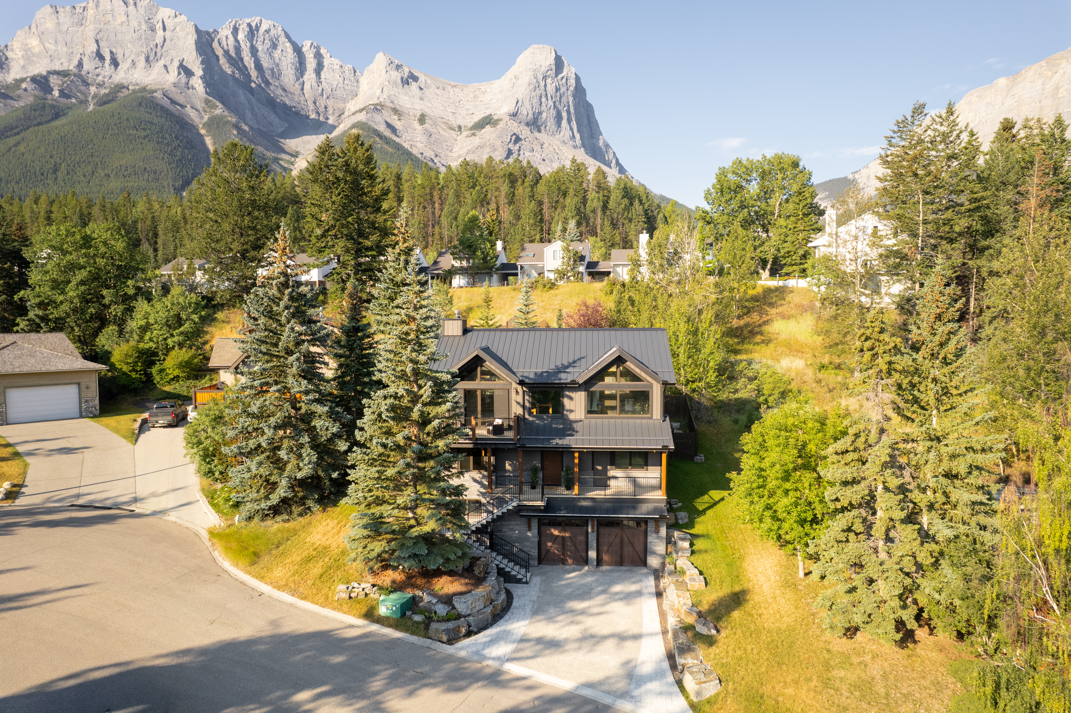 Just Listed: Elevated Mountain Living at 104 Rummel Place in Canmore header image.